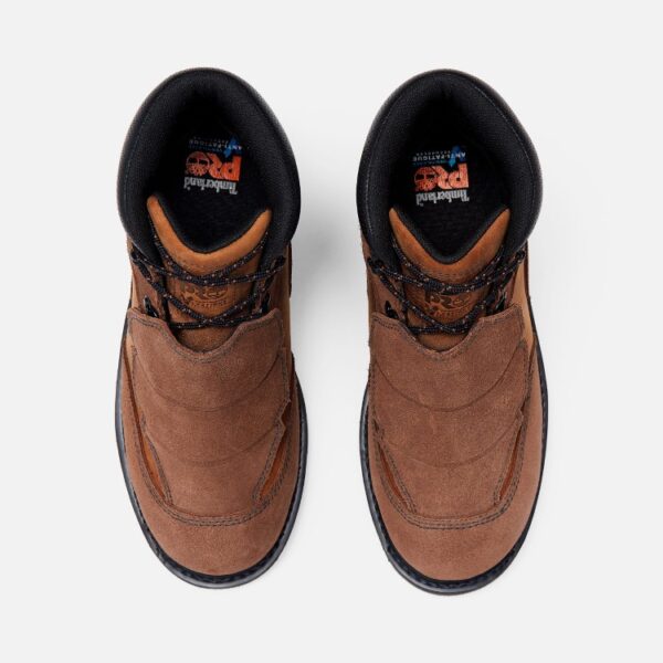 Overhead look at a pair of Timberland PRO Ambridge Met Guard composite toe 6-inch men's work boots in brown on a blank background.