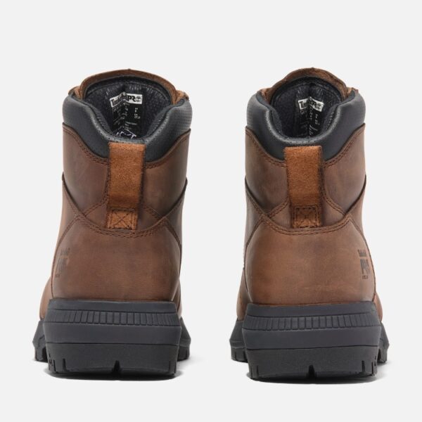 A look at the heels of a pair of Timberland Montauk steel toe 6-inch men's work boots in brown with a blank background.