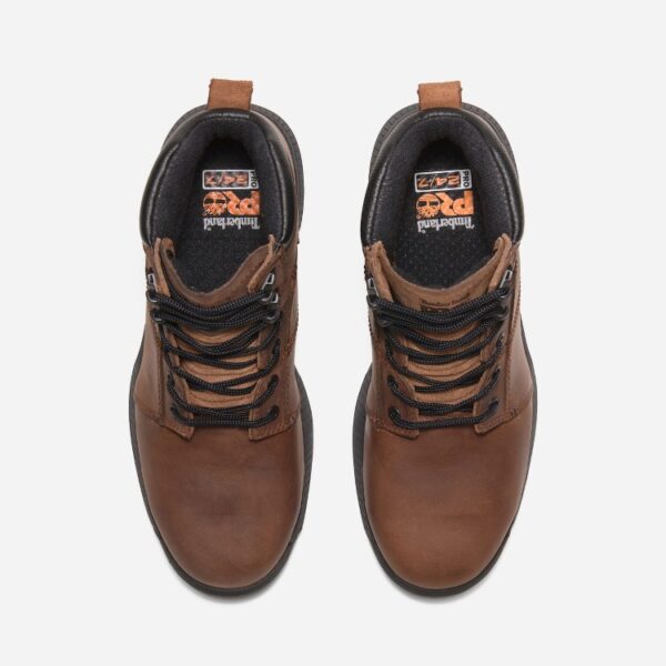 Overhead look at a pair of Timberland Montauk steel toe 6-inch men's work boots in brown on a blank background.