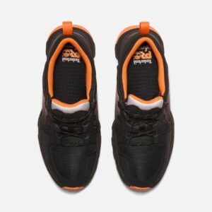 Overhead look at a pair of Timberland PRO Powertrain composite toe men's athletic work sneakers in black and orange on a blank background.