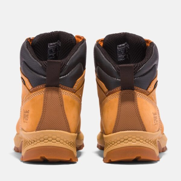 A look at the heels of a pair of Timberland TiTAN PRO EV composite toe waterproof 6-inch men's work boots in wheat with a blank background.