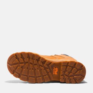 The sole of the right boot on a Timberland PRO TiTAN EV composite toe waterproof men's 6-inch work boots in wheat with a blank background.