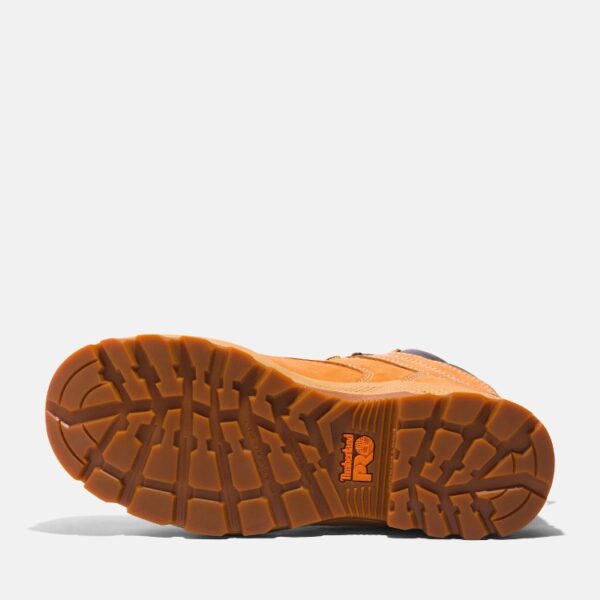 The sole of the right boot on a Timberland PRO TiTAN EV composite toe waterproof men's 6-inch work boots in wheat with a blank background.