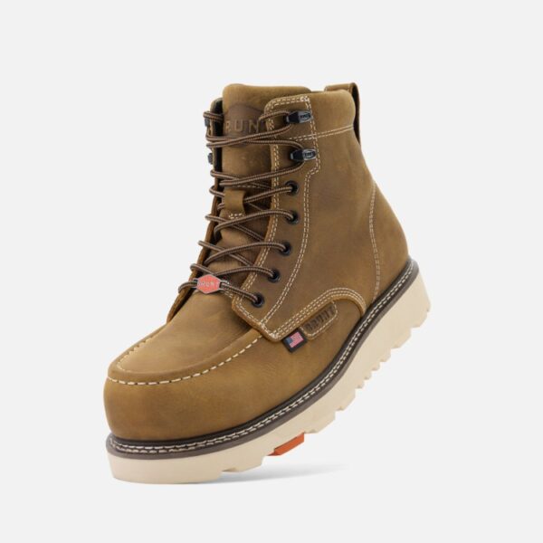 An angled, downward facing look at the left boot of a pair of Brunt USA Marin Welted Unlined Limited Edition soft toe men's 6-inch work boots in dark tan with a blank background.