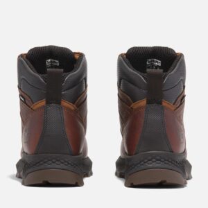 A look at the heels of a pair of Timberland TiTAN EV composite toe waterproof insulated 6-inch women's work boots in brown with a blank background.