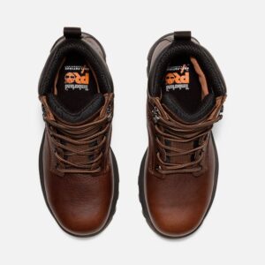 Overhead look at a pair of Timberland TiTAN EV composite toe waterproof insulated 6-inch women's work boots in brown on a blank background.