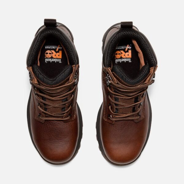 Overhead look at a pair of Timberland TiTAN EV composite toe waterproof insulated 6-inch women's work boots in brown on a blank background.