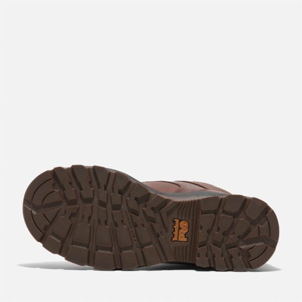 The sole of the right boot on a Timberland TiTAN EV composite toe waterproof insulated women's 6-inch work boots in brown with a blank background.