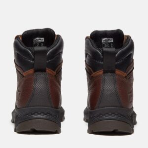 A look at the heels of a pair of Timberland TiTAN EV Met Guard composite toe women's 6-inch work boots in brown with a blank background.