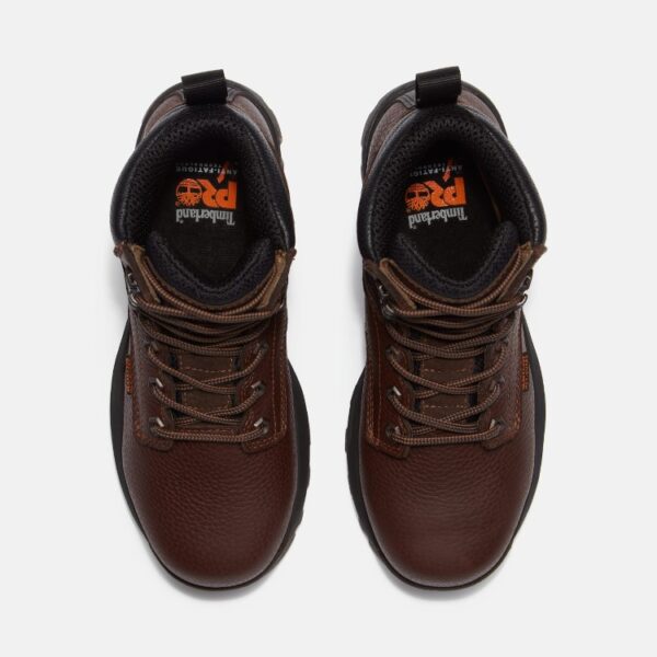 Overhead look at a pair of Timberland TiTAN EV Met Guard composite toe women's 6-inch work boots in brown on a blank background.