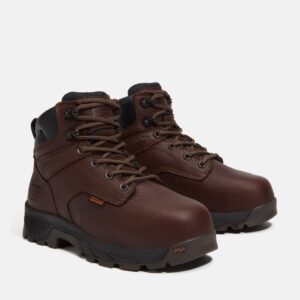 A turned pair of Timberland TiTAN EV Met Guard composite toe women's 6-inch work boots in brown with a blank background.