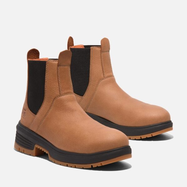 A turned pair of Timberland PRO Birchline composite toe women's 6-inch pull-on work boots in brown with a blank background.