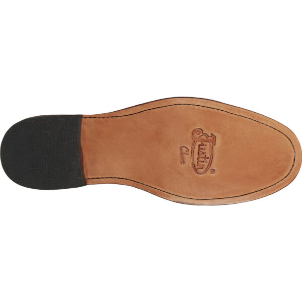 The sole of a Justin Drennan 7" Brown Men's Lace Up Roper Boot.