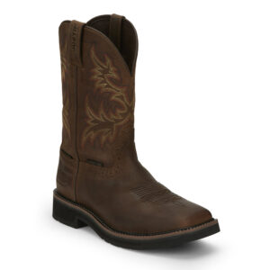 A 3/4 turned Justin Driller 11" Waterproof Men's Work Steel Toe Pull On Boot.