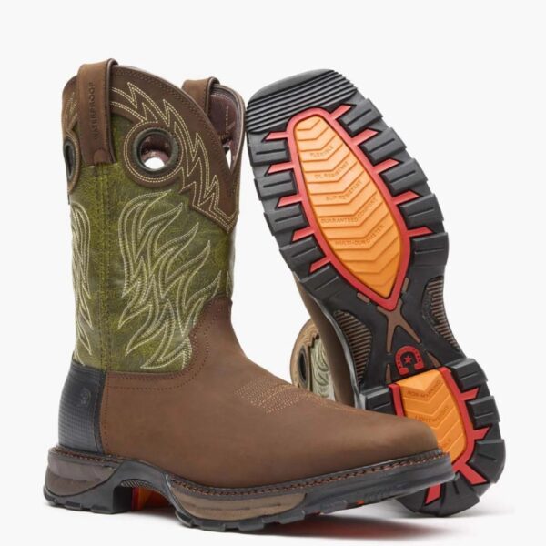 A 3/4 turned pair of Durango Maverick XP Waterproof Western Pull-On Work Boots with a look at the sole of the left boot.