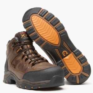 A 3/4 turned pair of Durango Renegade XP Waterproof Timber Brown Alloy Toe Hikers with a look at the sole of the left boot.