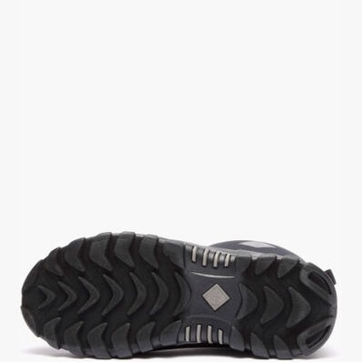The sole of a Muck Women's Arctic Sport II Mid Rubber Boot.