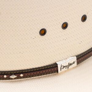 A closeup look at the hatband on a Resistol 10X Kingman Straw Cowboy Hat.