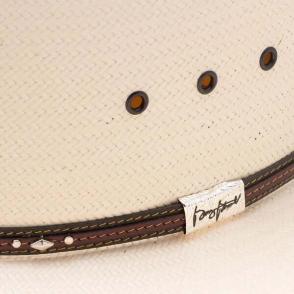 A closeup look at the hatband on a Resistol 10X Kingman Straw Cowboy Hat.