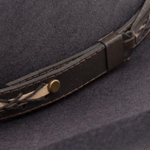 A closeup look at the hatband on a Resistol 4X Rearview Town Granite - Jason Aldean Cowboy Hat.