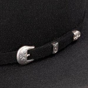 A closeup look at the hatband on a Resistol 6X Midnight Black Cowboy Hat.