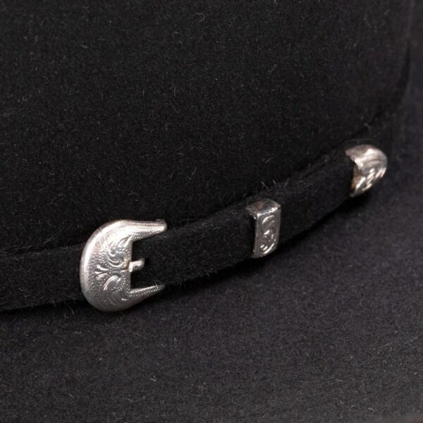 A closeup look at the hatband on a Resistol 6X Midnight Black Cowboy Hat.