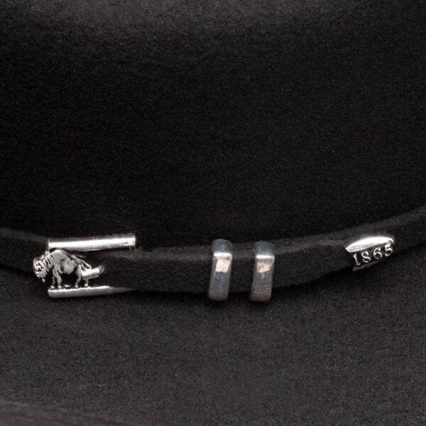 A closeup look at the hatband on a Stetson Apache 4X Black Cowboy Hat.