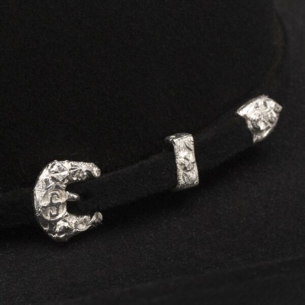 A closeup look at the hatband on a Stetson Duncan 4X Black Cowboy Hat.