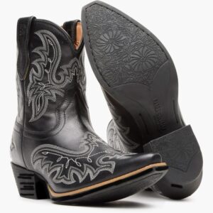 A 3/4 turned pair showing off the sole of a Durango Women's Shyloh Polished Black Onyx Pony Boot.