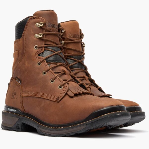 A 3/4 right turned pair of Rocky Rams Horn Composite Toe 9" Western Work Boots.