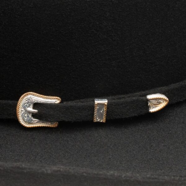A closeup look at the hatband on a Stetson Oakridge 3X Black Cowboy Hat.