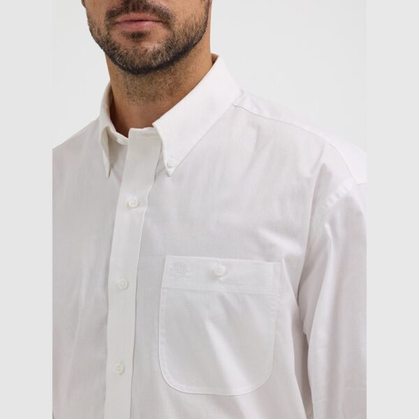 A closeup shot of the pocket on a Wrangler George Strait Button Down Shirt.