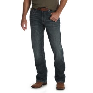 A modeled, forward-facing look at a pair of Wrangler Men's 20X No. 42 Vintage Bootcut Jeans.