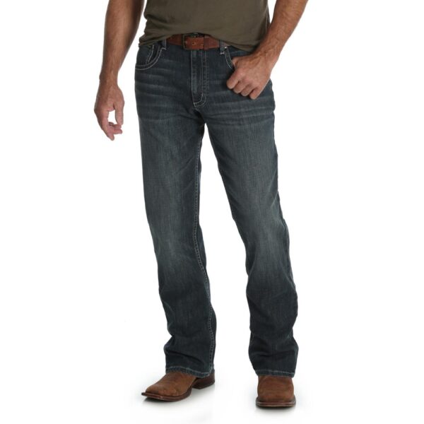A modeled, forward-facing look at a pair of Wrangler Men's 20X No. 42 Vintage Bootcut Jeans.