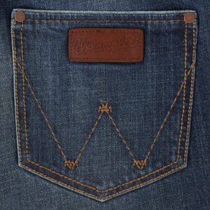 A detailed, closeup look at the stitching and design on a Wrangler Men's Retro Relaxed Fit Bootcut Jean pocket.