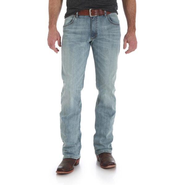 A modeled, forward-facing look at a pair of Wrangler Men's Retro Slim Fit Bootcut Jeans.