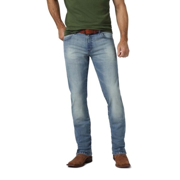 A modeled, forward-facing look at a pair of Wrangler Men's Retro Slim Fit Straight Leg Jeans.