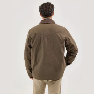 A modeled, back facing look at the Wrangler Men's Western Lined Canvas Barn Coat.