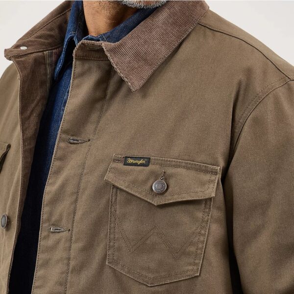A closeup look at chest pocket on a Wrangler Men's Western Lined Canvas Barn Coat.