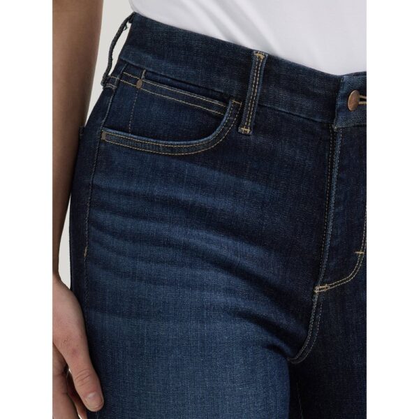 A modeled, close-up look at the detail on the front pocket of a pair of Wrangler Women's Bespoke High Rise Skinny Jeans.