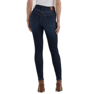 A modeled, rear-facing look at a pair of Wrangler Women's Bespoke High Rise Skinny Jeans.