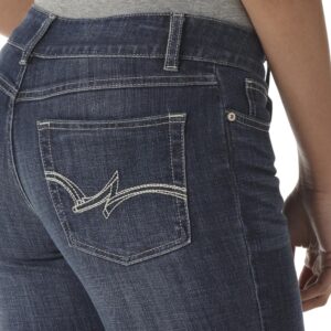 A modeled, close-up look at the detail on the back pocket of a pair of Wrangler Women's Essential Mid-Rise Bootcut Jeans.
