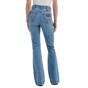 A modeled, rear-facing look at a pair of Wrangler Women's Retro Bailey High Rise Trouser Jeans.