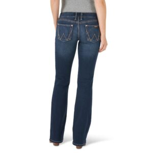 A modeled, rear-facing look at a pair of Wrangler Women's Retro Mae Mid-Rise Bootcut Jeans.