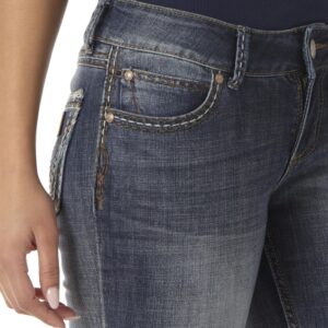 A modeled, close-up look at the detail on the front pocket of a pair of Wrangler Women's Retro Sadie Bootcut Jeans.