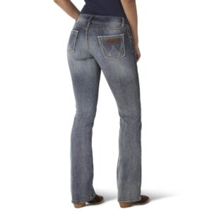 A modeled, rear-facing look at a pair of Wrangler Women's Retro Sadie Bootcut Jeans.