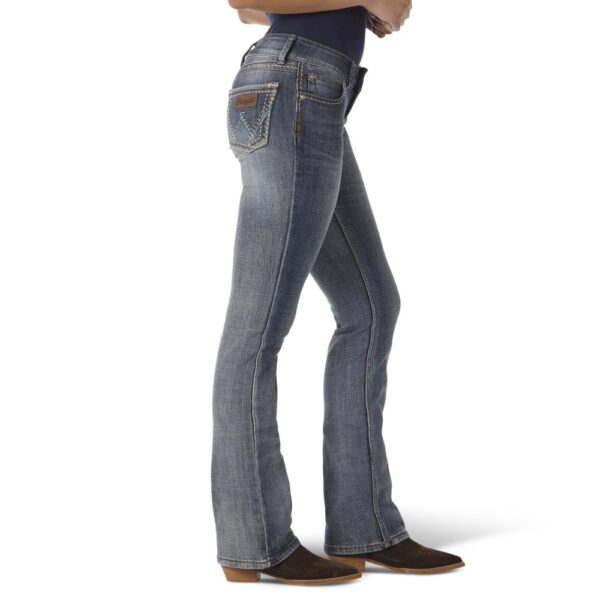 A modeled, right-side-facing look at a pair of Wrangler Women's Retro Sadie Bootcut Jeans.