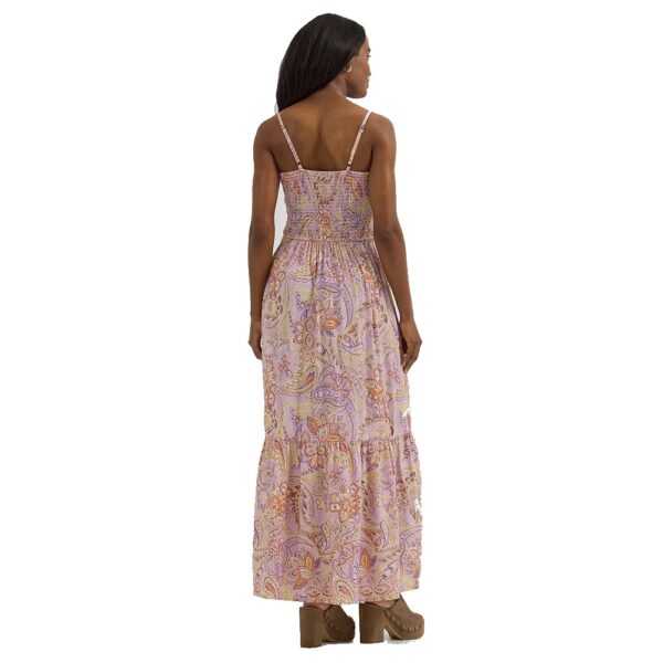 A modeled, rear facing, full body look at the Wrangler Women's Smocked Bodice Maxi Dress.