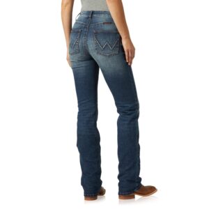 A modeled, rear-facing look at a pair of Wrangler Women's Ultimate Riding Willow Mid-Rise Bootcut Jeans.
